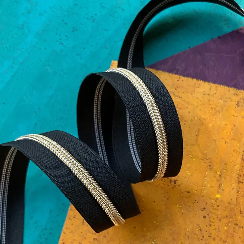Black Zipper Tape with Gold Teeth - 3 yards